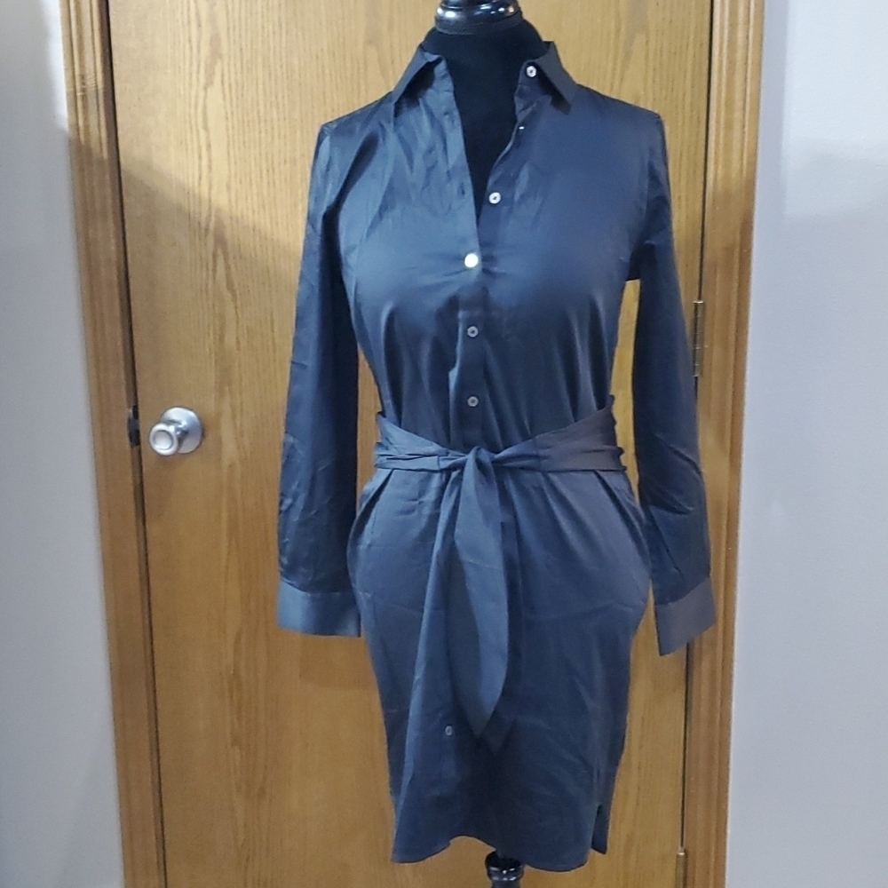 Untuckit for her black belted shirt dress Angelina